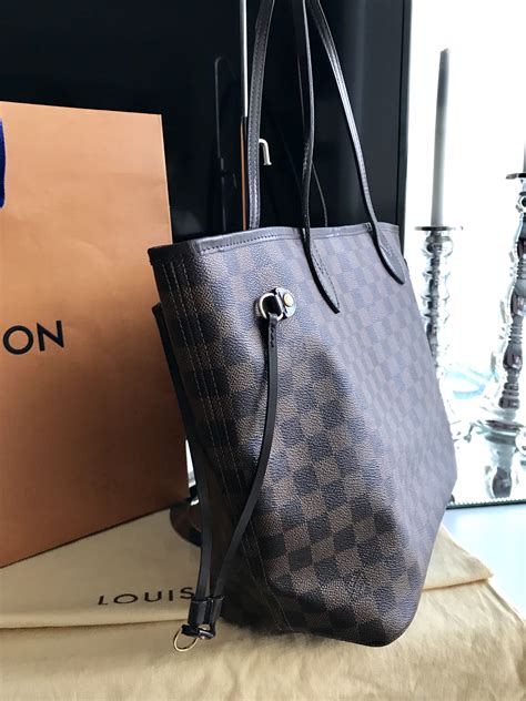 louis vuitton neverfull mm damier ebene canvas tote|louis vuitton damier ebene geronimos.